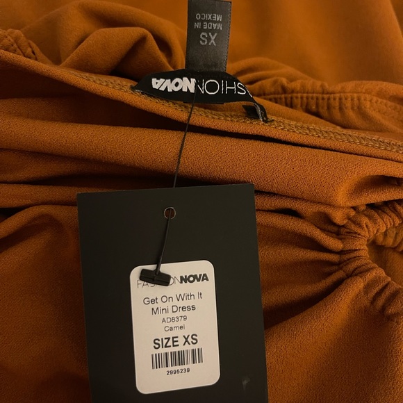 Never worn, caramel color , good condition, stretchable - Picture 4 of 4